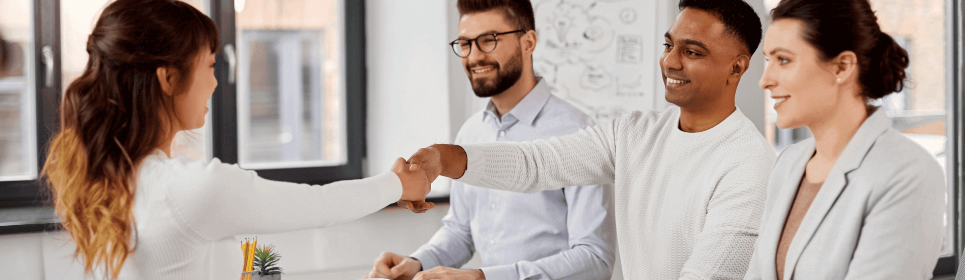 employee shaking hands with new employer